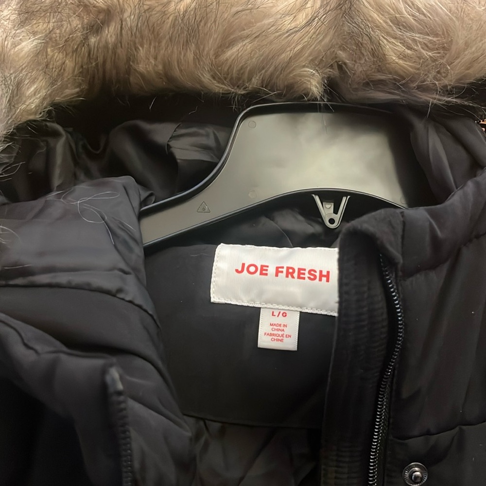 NWT Long black Puffer coat.